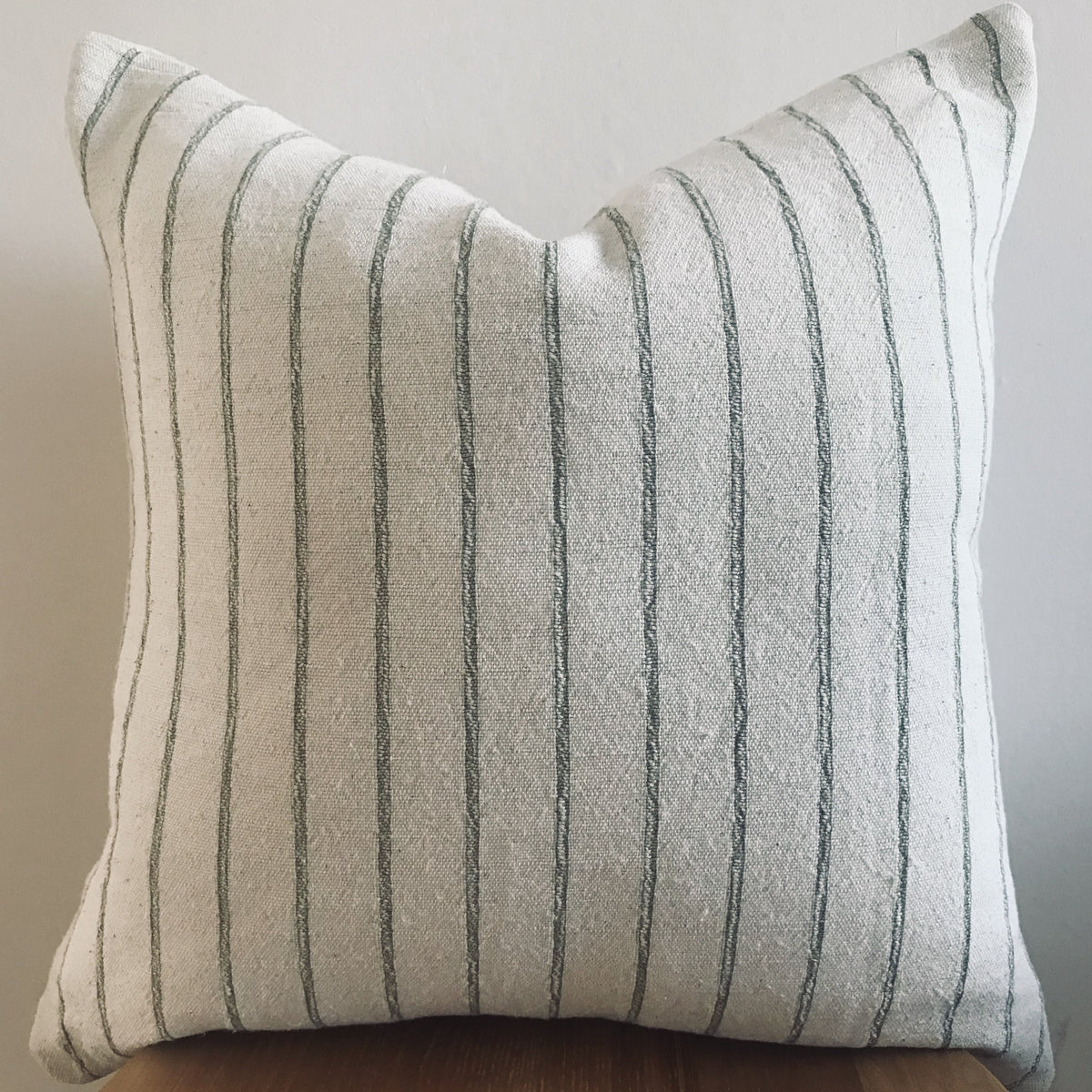 Green hot sale striped cushions