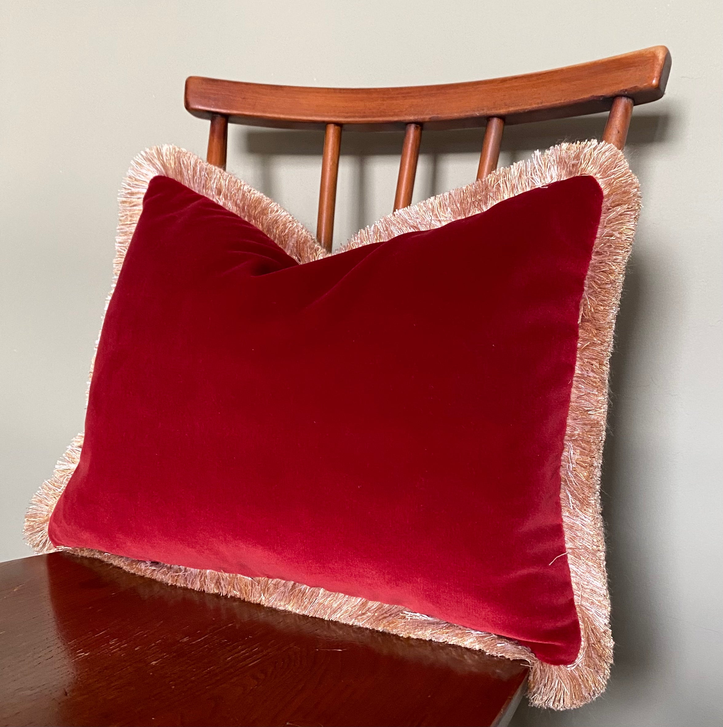 Red velvet cushion with gold fringe trim – Bonny Boutique