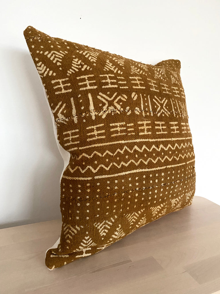 mustard mudcloth cushion