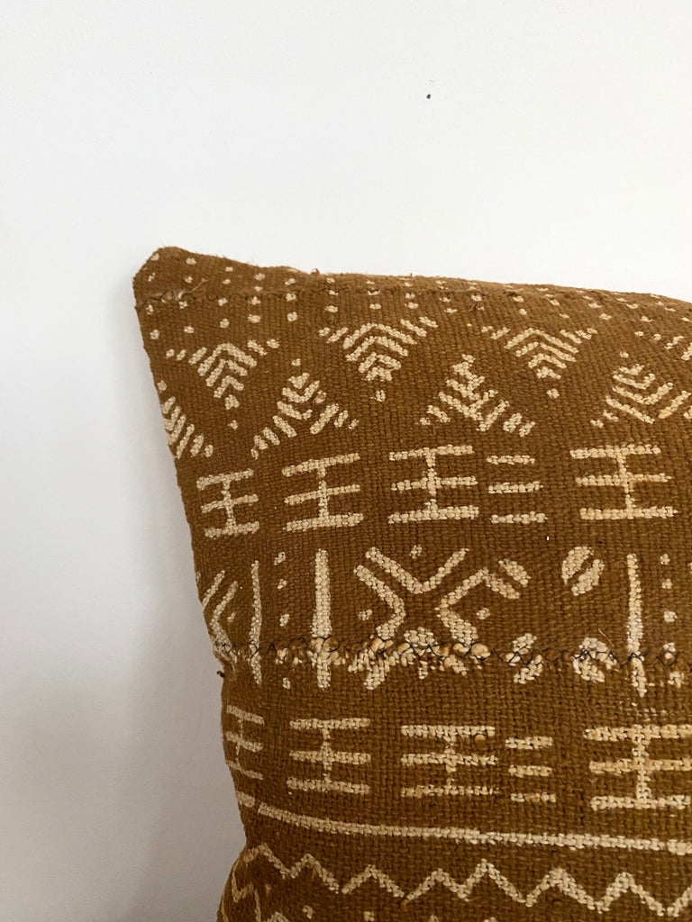 mustard mudcloth cushion