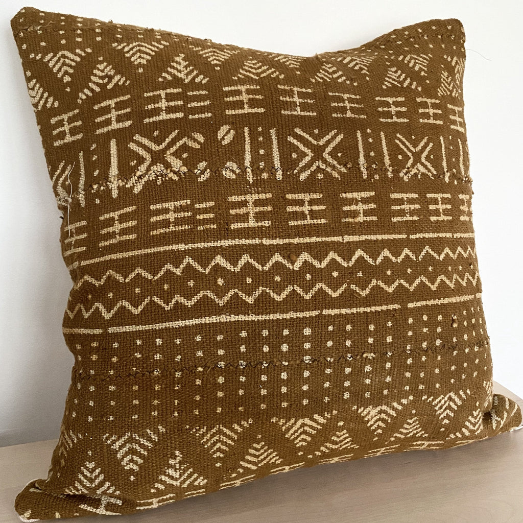mustard mudcloth cushion